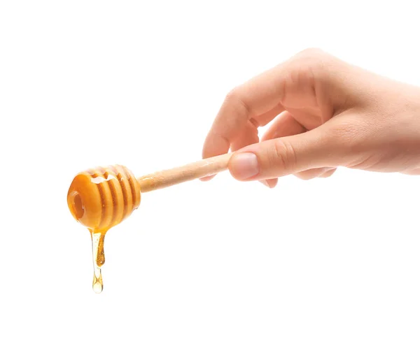 Woman holding dipper with honey — Stock Photo, Image