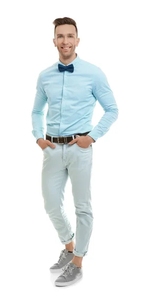 Hombre joven guapo en pajarita sobre fondo blanco —  Fotos de Stock