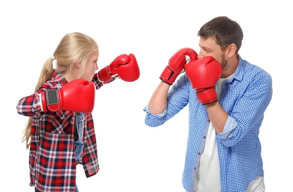 Cute little girl and her father boxing on white background — Stock Photo, Image