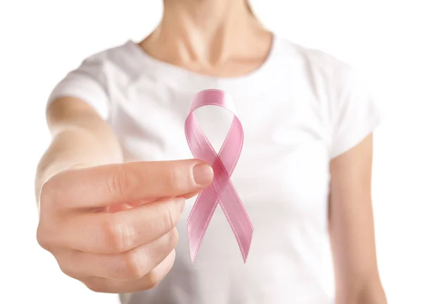 Woman holding pink ribbon on white background. Breast cancer awareness concept — Stock Photo, Image