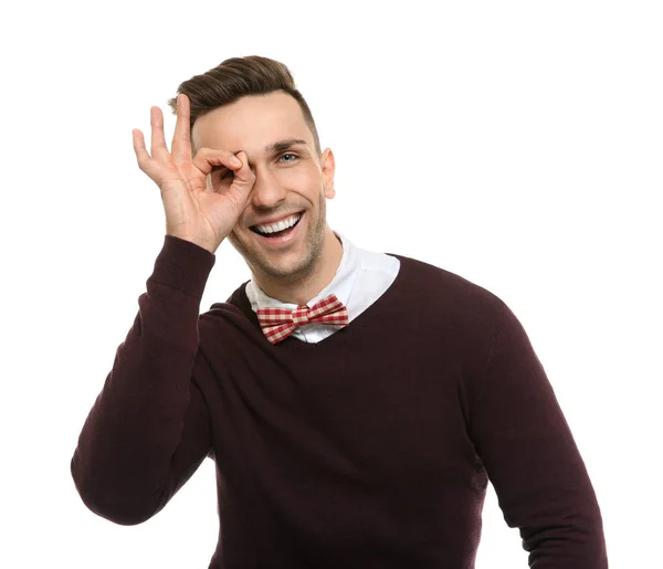 Handsome young man in bow tie on white background — Stock Photo, Image