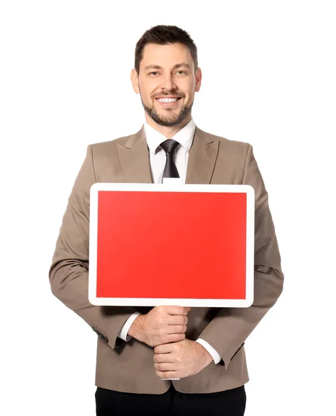 Man in formal wear holding empty red sign — Stock Photo, Image