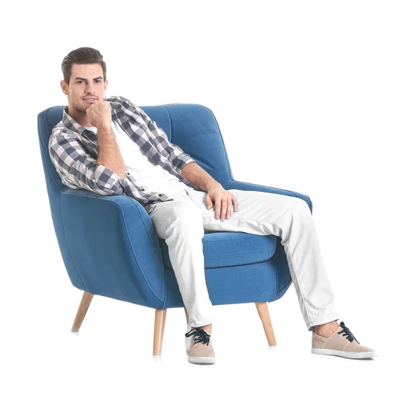 Homem sentado em poltrona — Fotografia de Stock