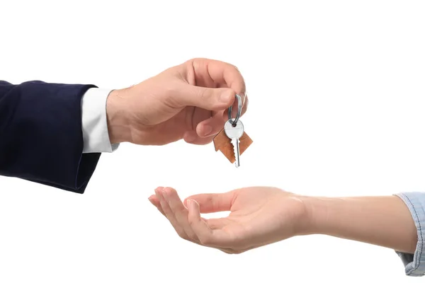 Real estate agent giving key — Stock Photo, Image