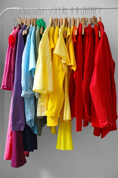 Rack with rainbow clothes