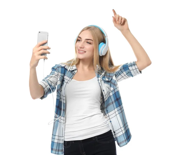 Žena s mobilním telefonem, poslechu hudby — Stock fotografie