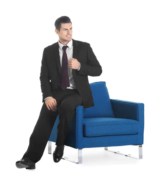 Man sitting in armchair — Stock Photo, Image