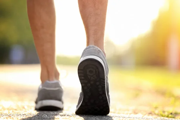 Legs of sporty young man — Stock Photo, Image