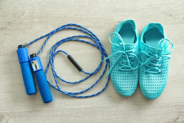 Jumping rope and sneakers — Stock Photo, Image