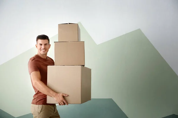 Man with moving boxes — Stock Photo, Image
