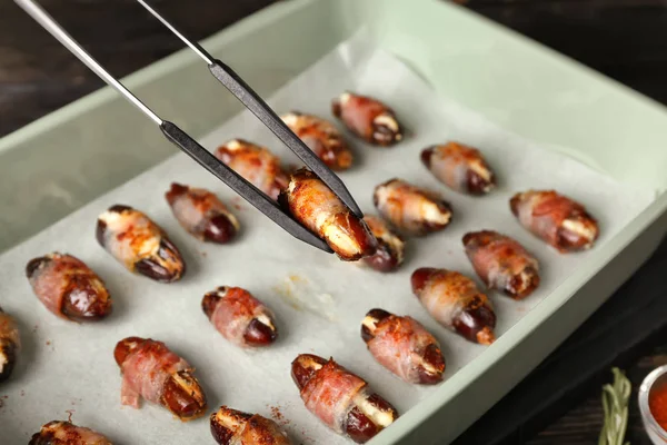 Bacon wrapped dates — Stock Photo, Image