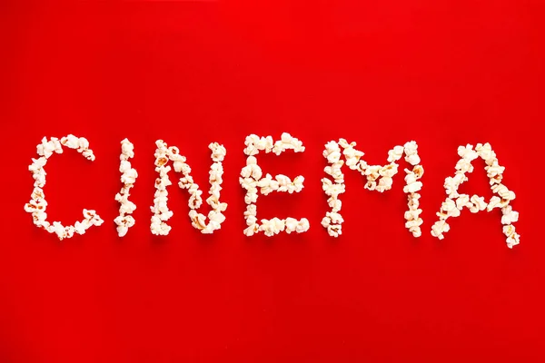 Word CINEMA made of popcorn — Stock Photo, Image