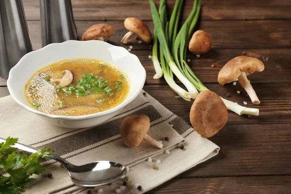 Bowl of delicious shiitake mushroom soup on table — Stock Photo, Image