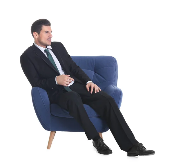 Man sitting in armchair — Stock Photo, Image