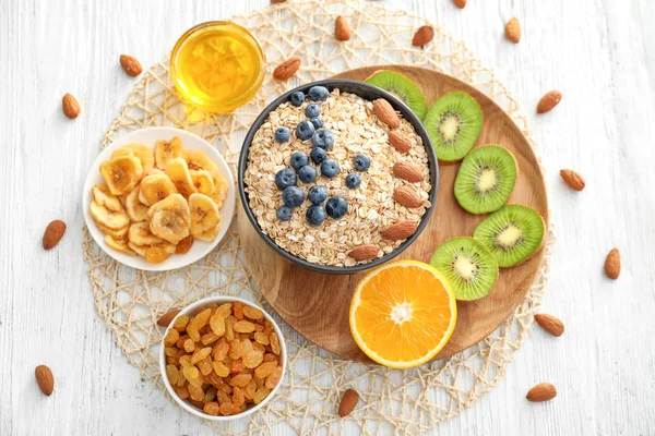 Composition with oatmeal flakes — Stock Photo, Image