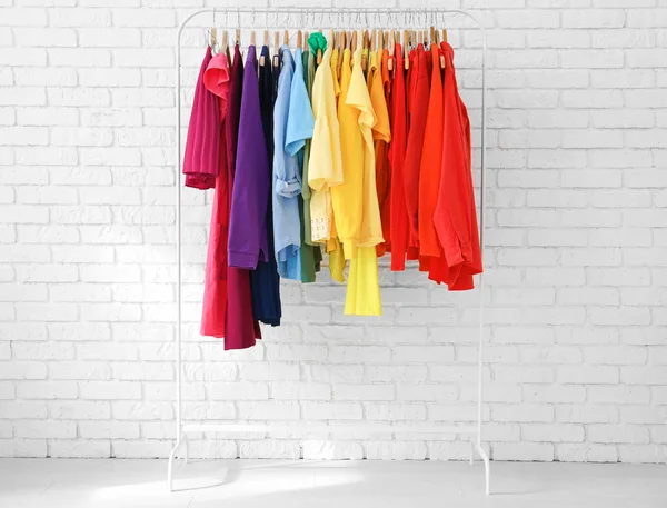 Rack with rainbow clothes