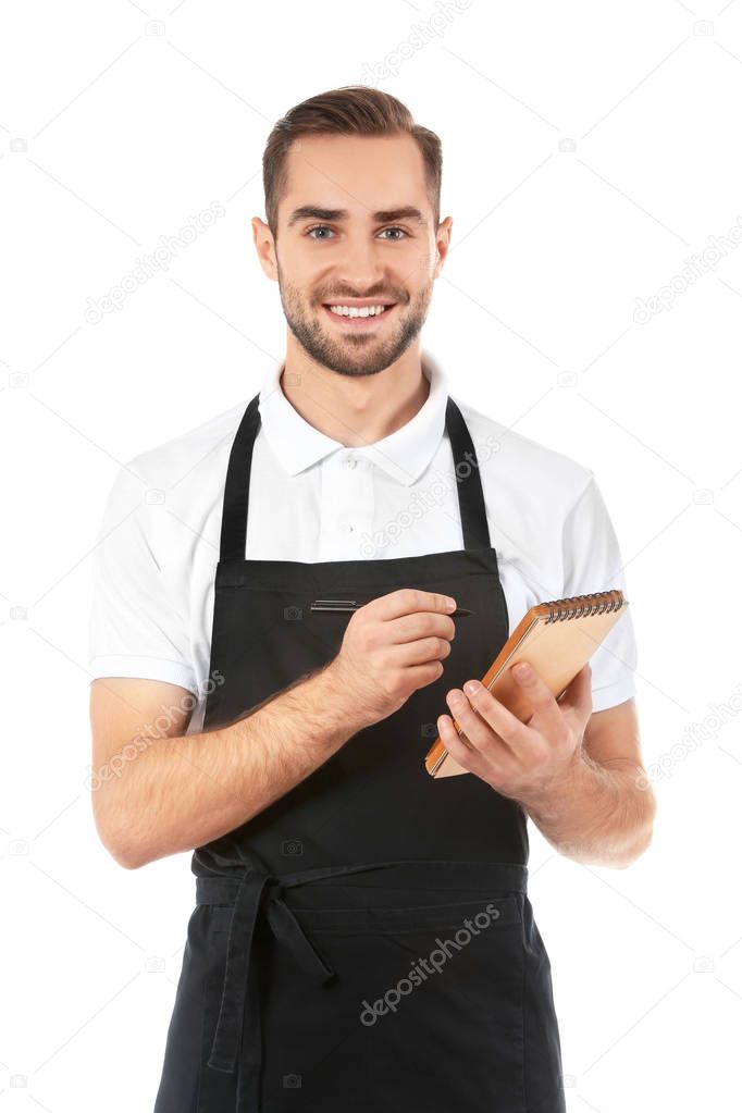 Handsome waiter writing down order