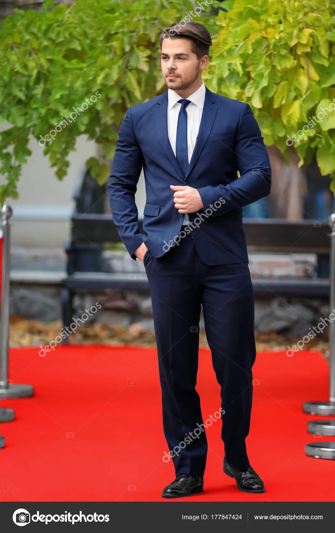 black suit red carpet