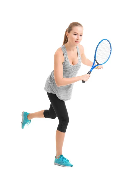 Beyaz arka planda tenis oynayan genç bir kadın — Stok fotoğraf