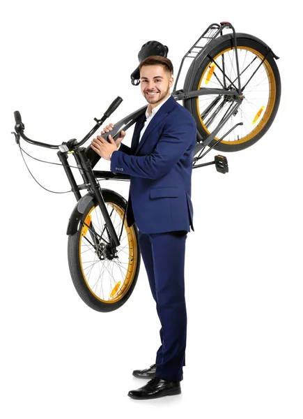 Jeune homme d'affaires beau tenant vélo sur fond blanc — Photo