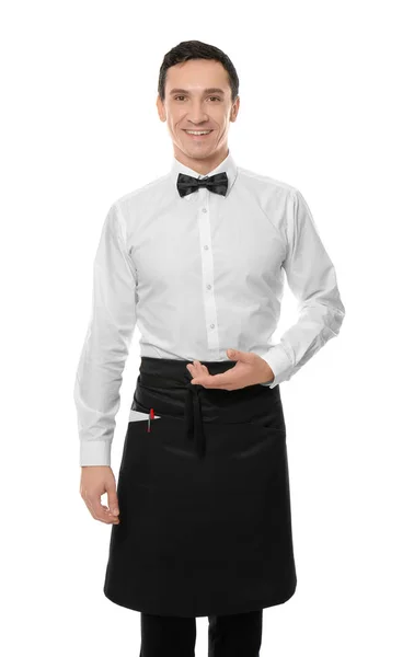 Gutaussehender Kellner in Uniform auf weißem Hintergrund — Stockfoto