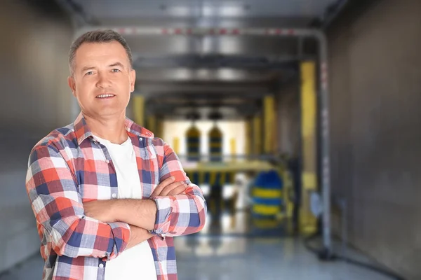 Owner of business at his car wash — Stock Photo, Image