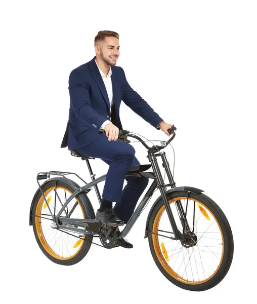 Jovem empresário bonito com bicicleta no fundo branco — Fotografia de Stock