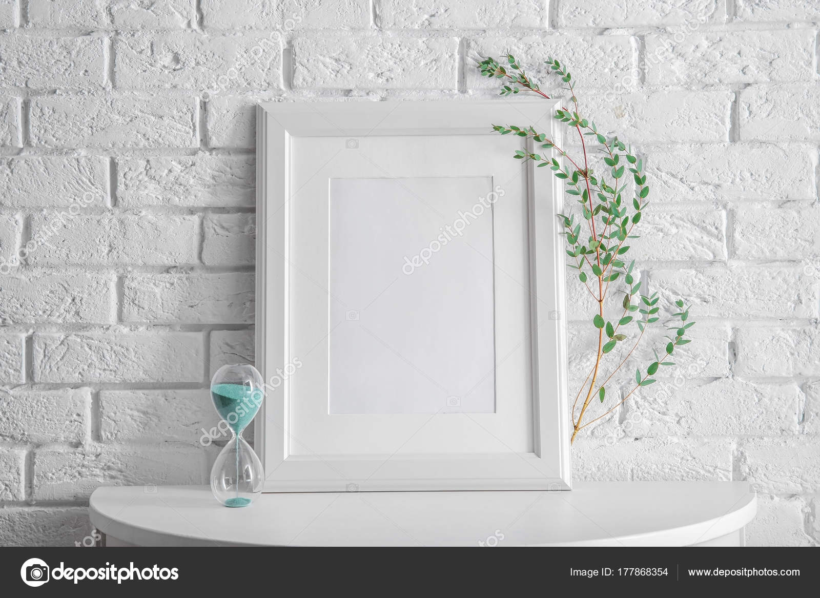 Download Mockup Of Blank Frame On Table Stock Photo C Belchonock 177868354 Yellowimages Mockups