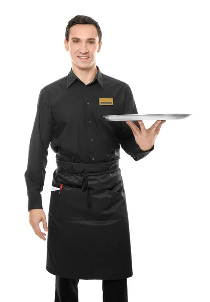 Официант держит пустой поднос на белом фоне — стоковое фото
