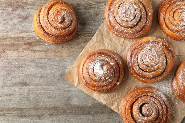 Sweet cinnamon rolls on table — Stock Photo, Image