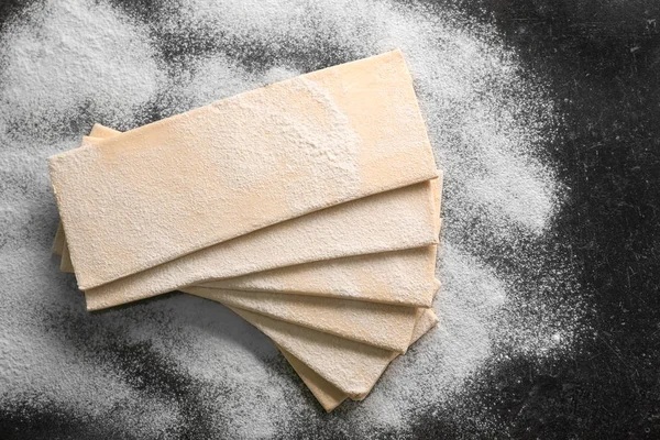 Fresh raw puff dough on table — Stock Photo, Image