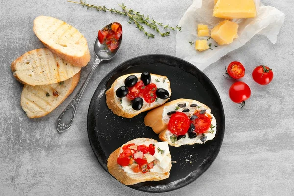 Plate with tasty bruschettas — Stock Photo, Image