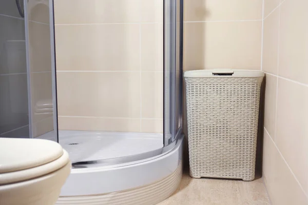 Laundry basket in bathroom — Stock Photo, Image