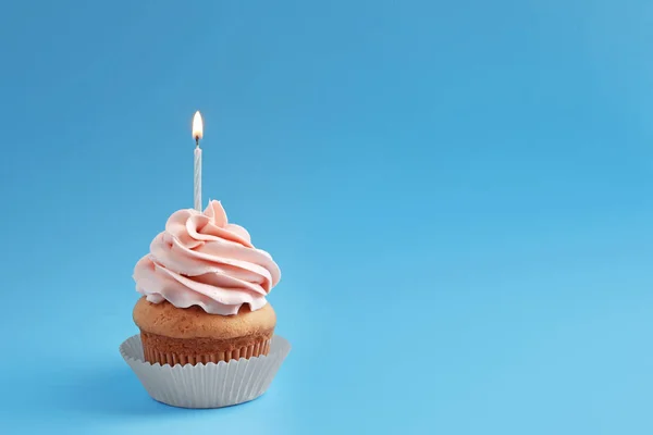 Tasty Cupcake Candle Color Background — Stock Photo, Image