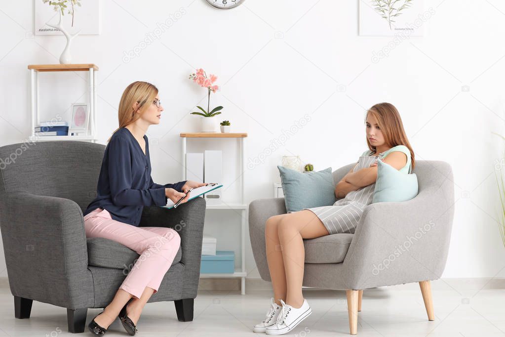 Psychologist working with patient 