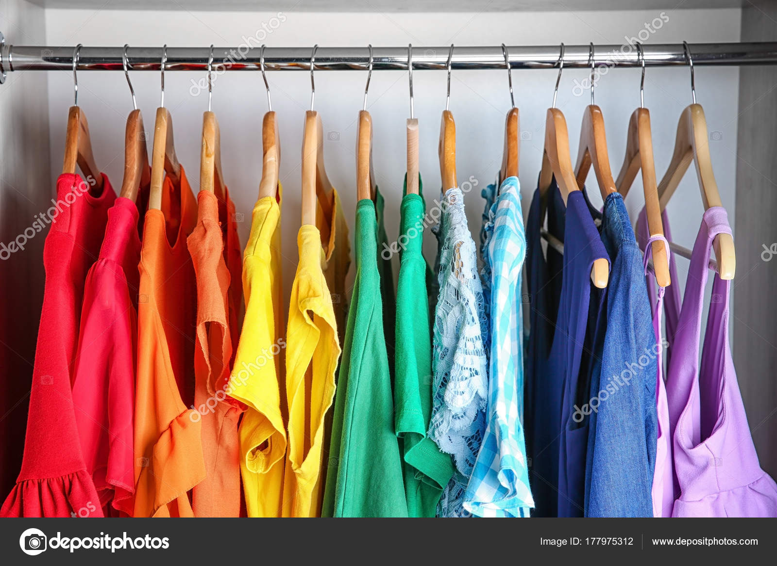 https://st3.depositphotos.com/1177973/17797/i/1600/depositphotos_177975312-stock-photo-colorful-clothes-on-hangers-in.jpg