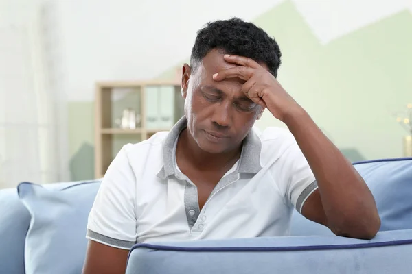 Thoughtful Mature African American Man Sitting Sofa Home — Stock Photo, Image