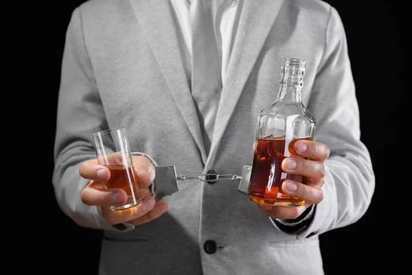 Man Handcuffs Bottle Glass Brandy Dark Background Alcohol Dependence Concept — Stock Photo, Image