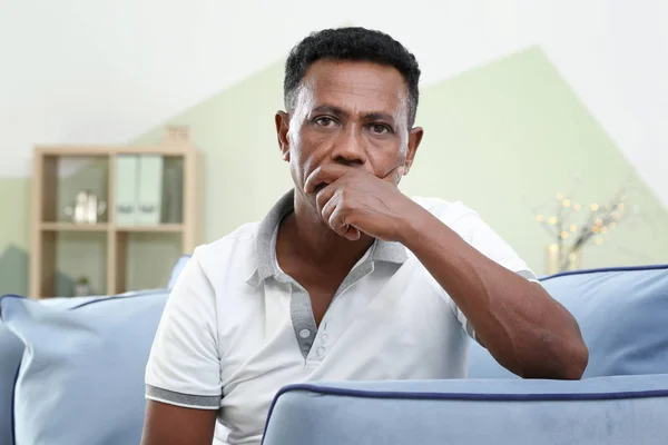 Thoughtful Mature African American Man Sitting Sofa Home — Stock Photo, Image
