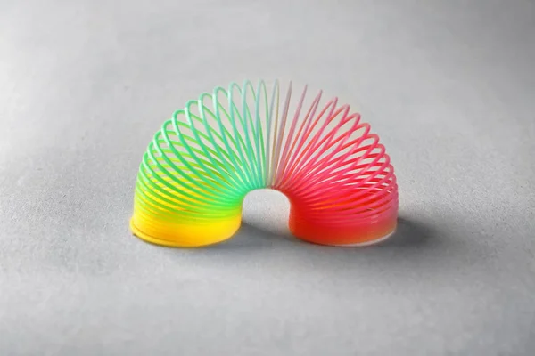 Rainbow Slinky Цветном Фоне Игрушка Детей — стоковое фото