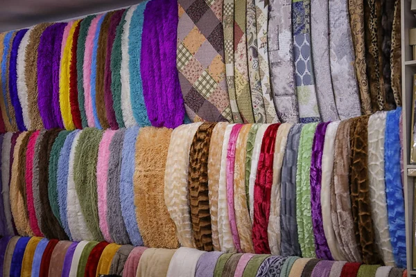 Assortment of soft blankets in store — Stock Photo, Image