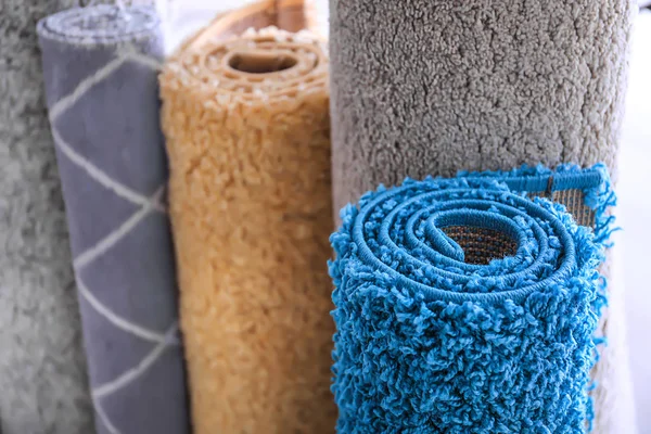 Rolled colorful carpets, closeup — Stock Photo, Image
