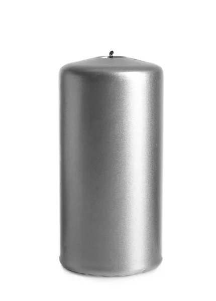 Metallic pillar candle against white background