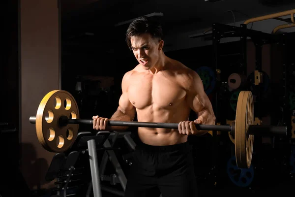 Ισχυρός Άνδρας Που Κάνει Άσκηση Barbell Στο Γυμναστήριο — Φωτογραφία Αρχείου