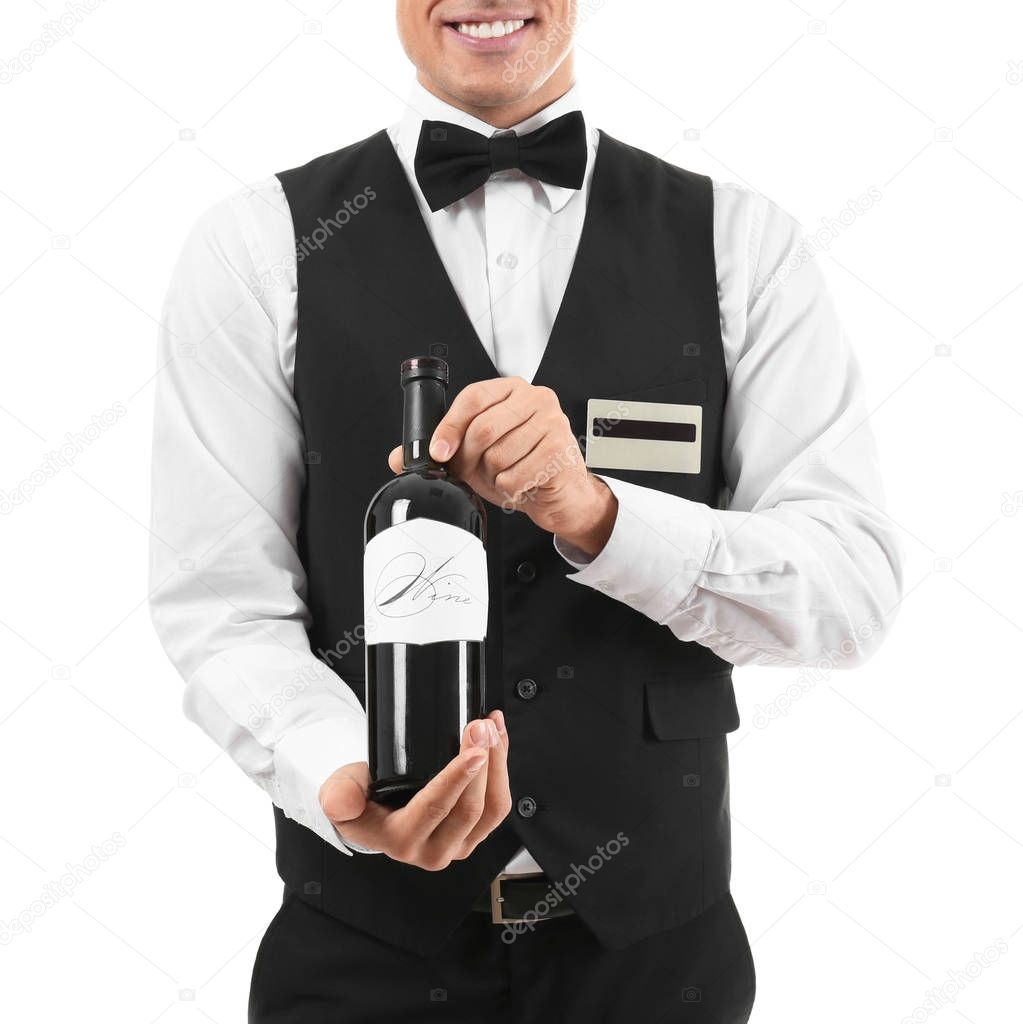 Waiter holding bottle of wine on white background