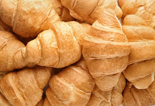 Vele lekkere verse croissants, close-up — Stockfoto