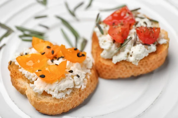 Tasty bruschettas with tomatoes — Stock Photo, Image