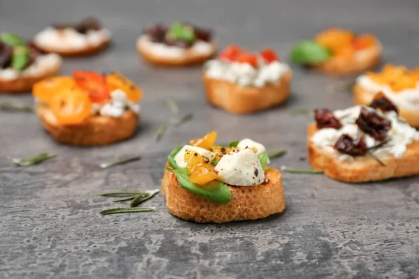 Tasty bruschetta with tomatoes — Stock Photo, Image