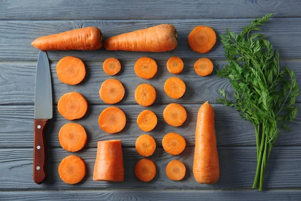 Composizione con carota tagliata — Foto Stock
