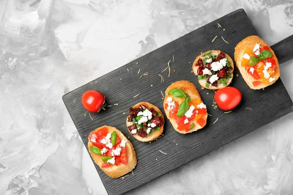 Tasty bruschettas with tomatoes — Stock Photo, Image